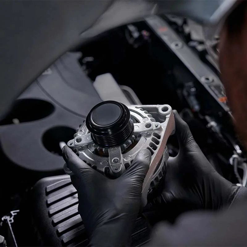 alternator-5-sq Mechanic inspecting alternator