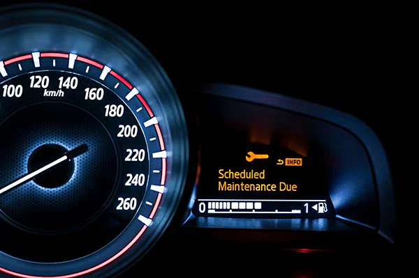 check-engine_1 Car dashboard with scheduled maintenance due displaying
