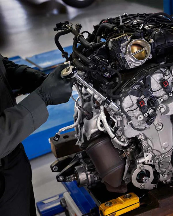 engine-repair-6 Mechanic working on engine