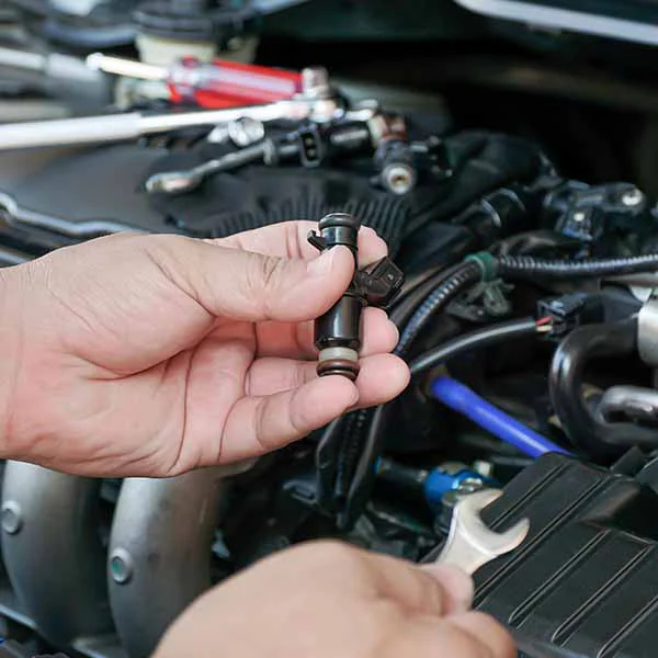 tune-up-4-sq Mechanic changing out cabin air filter